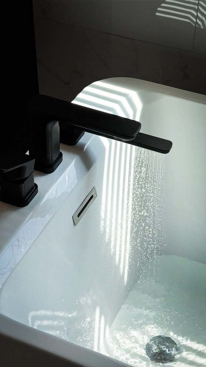 Waterfall Tub Filler — Vanities & Fixtures by Inside The House Calgary